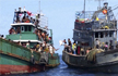 Boat carrying hundreds of migrant Asians pushed back to the sea
